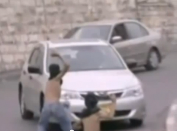 Palestinian Children throw rocks Jerusalem