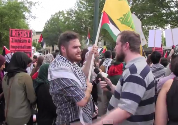 Hezbollah flag Israel protest July 11 2014