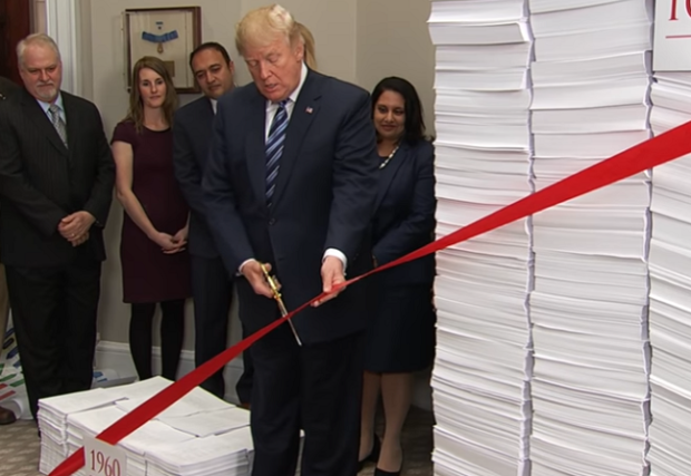 Trump-cutting-the-red-tape-of-regulations-in-2017-620x427.png