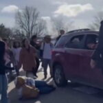 High School Student Protesting ICE Runs in Front of Car With Trump Flag, Gets Hit